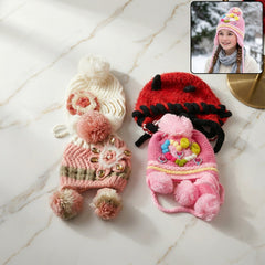 warm winter cap for children with pom pom design